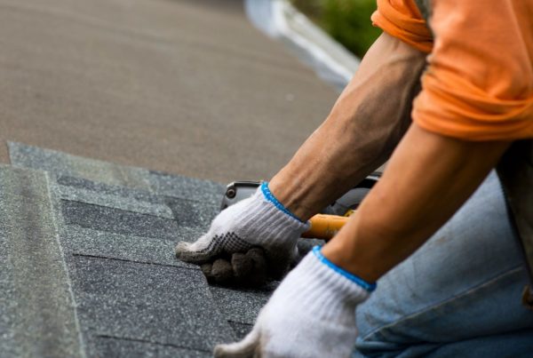 Man Laying Roofing