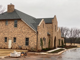 A residential house with Capstone roofing